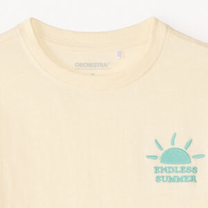 Camiseta de manga corta oversize con estampado y bordado divertido para niño. 