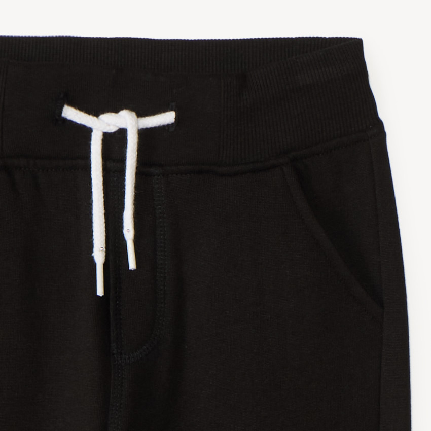Pantalón de chándal niño en felpa lisa 