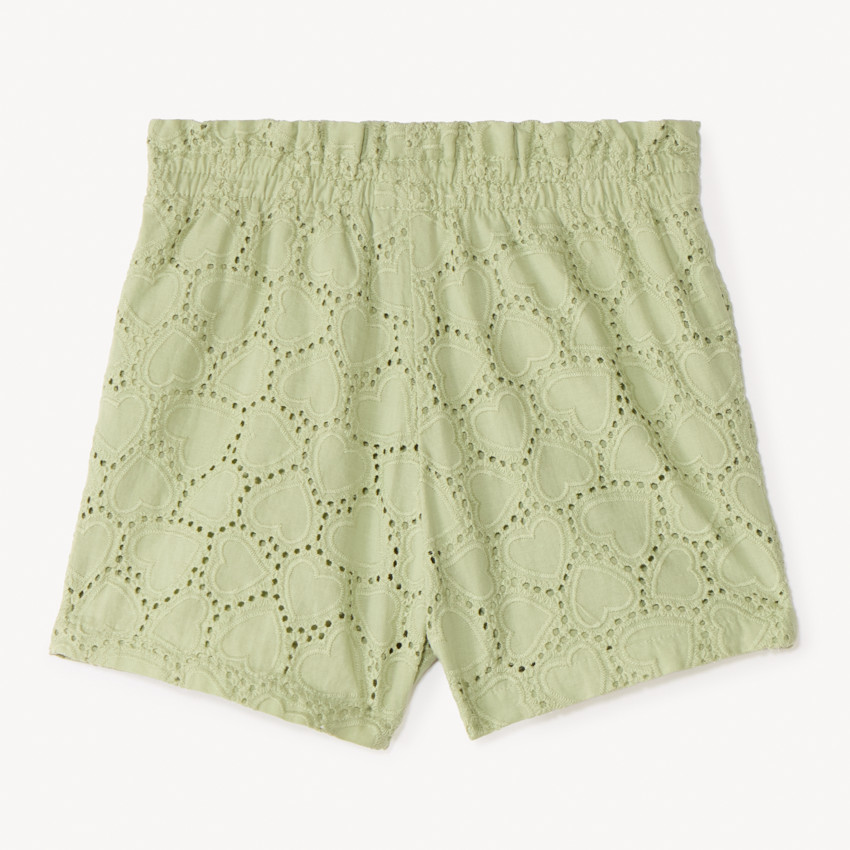 Pantalón corto liso de bordado inglés con lazo decorativo para niña bebé. 