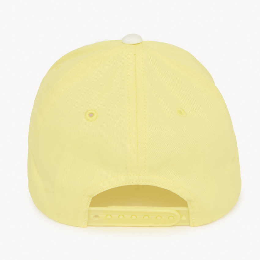 Gorra de sarga con efecto color block y bordado de limón para niña. 