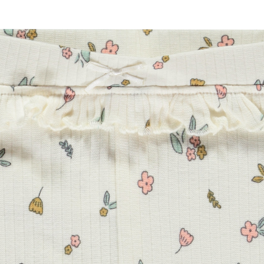 Caleón largo con volantes y estampado fantasía para niña 