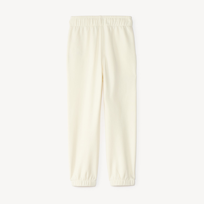 Pantalones de chándal para niña en felpa lisa con estampado. 