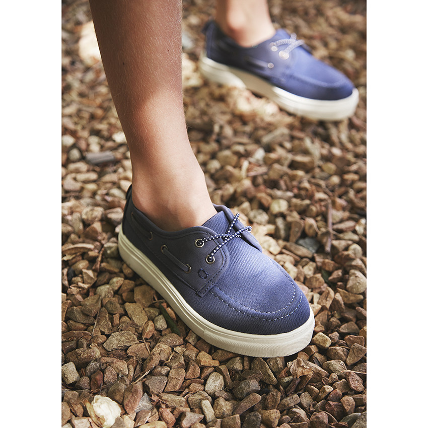 Zapatillas bajas de barco bi-materia con cordones elásticos para niño 