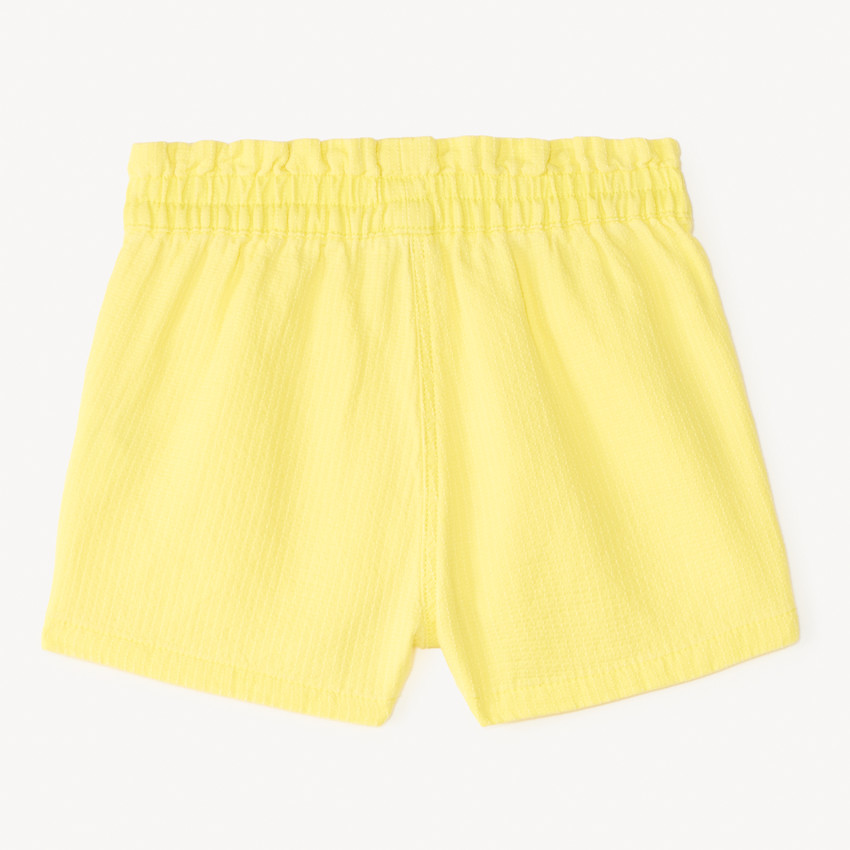 Short de tela en color sólido para niña. 