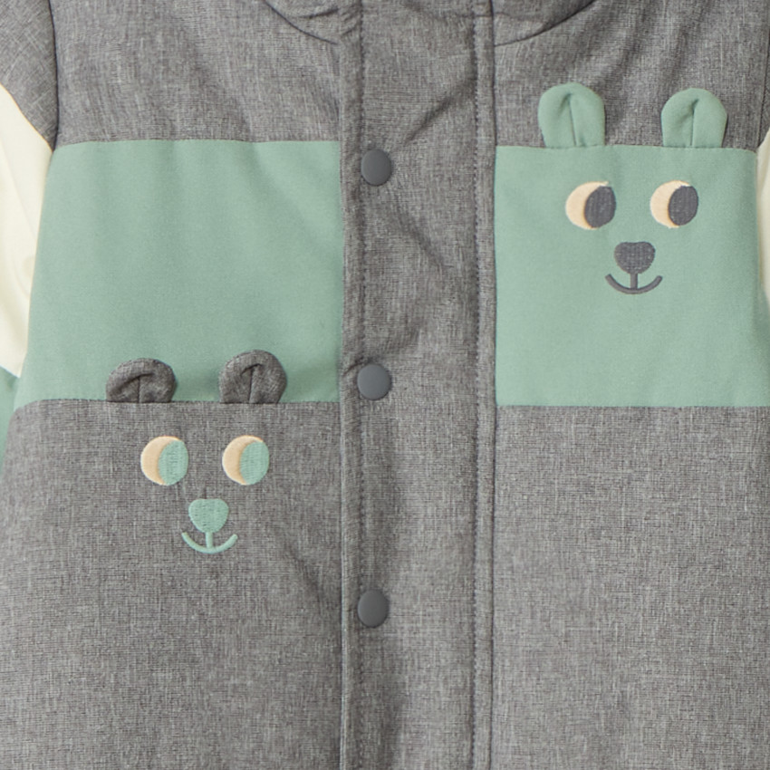 Combi-pilote déperlante et doublée pour bébé garçon avec finitions différentes selon l'âge 