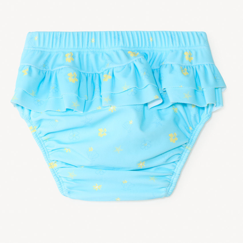 Pañal de baño imprimido con conchas y volantes para niña. 