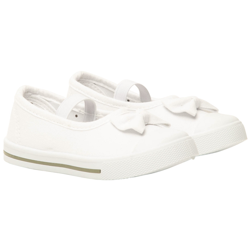 Babies blancas de lona con lazo y tirante elástico para niña 