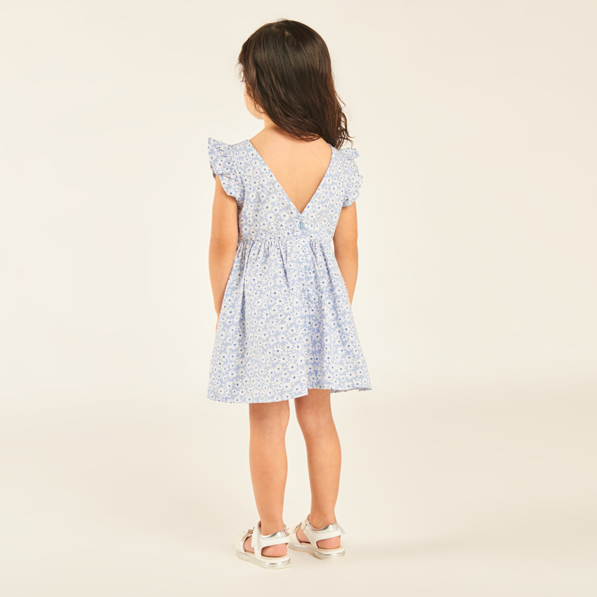Vestido con estampado floral y espalda pronunciada para niña. 