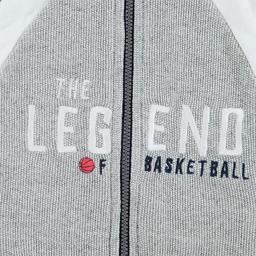 Chándal de felpa con inscripción bordada y bolsillos con cremallera 