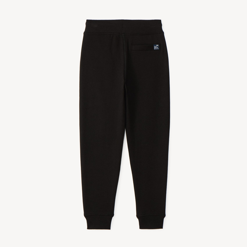 Pantalón de chándal niño en felpa lisa 