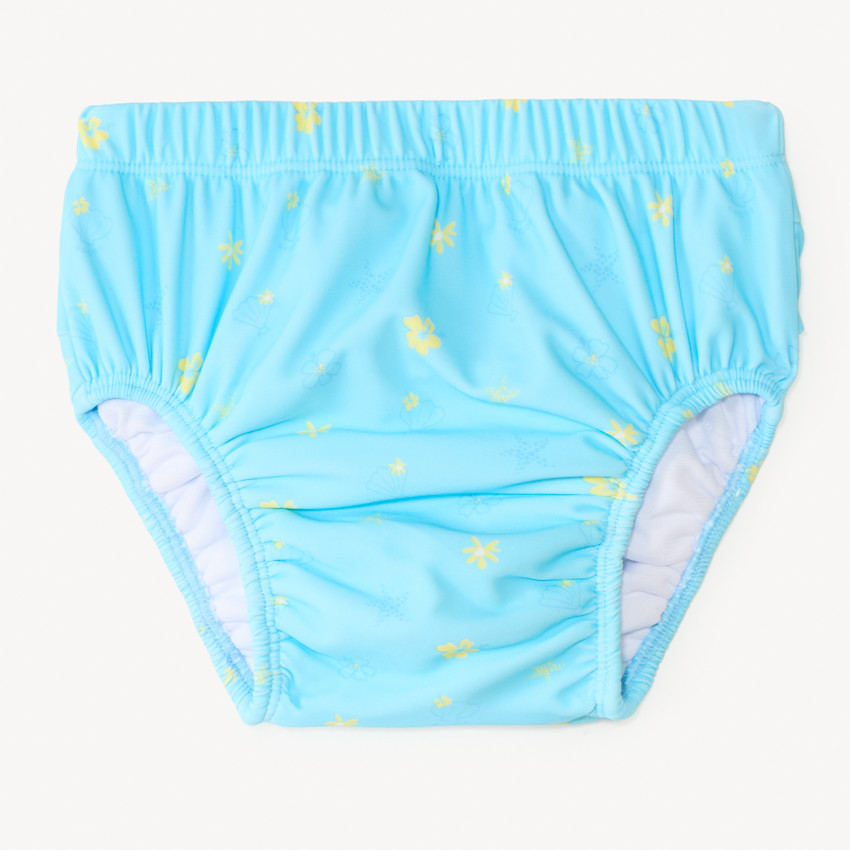 Pañal de baño imprimido con conchas y volantes para niña. 