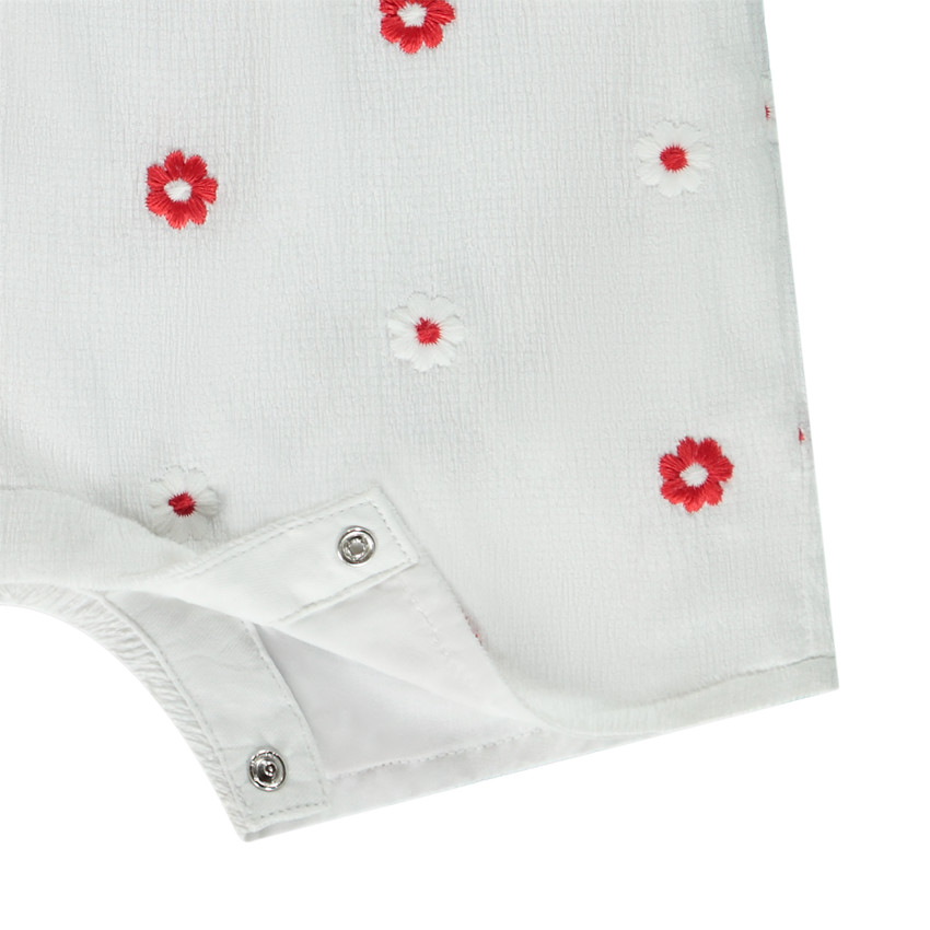 Combinaison corta bordada de flores efecto crêpe para bebé niña 