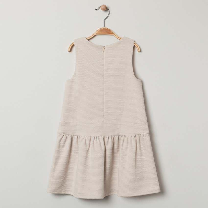 Vestido de ceremonia sin mangas punto fantasía y lazo 