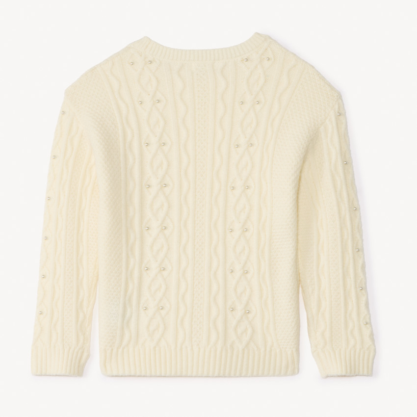 Suéter oversize de punto trenzado con perlas para niña. 