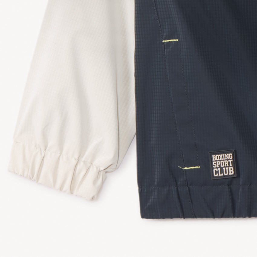 Cortavientos con capucha efecto color block para niño 