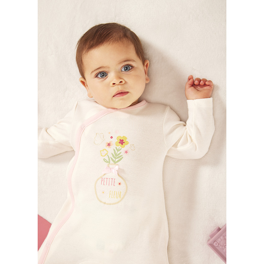 Lote de 2 peleles de efecto acanalado para bebé niña con diferentes aperturas según la edad. 