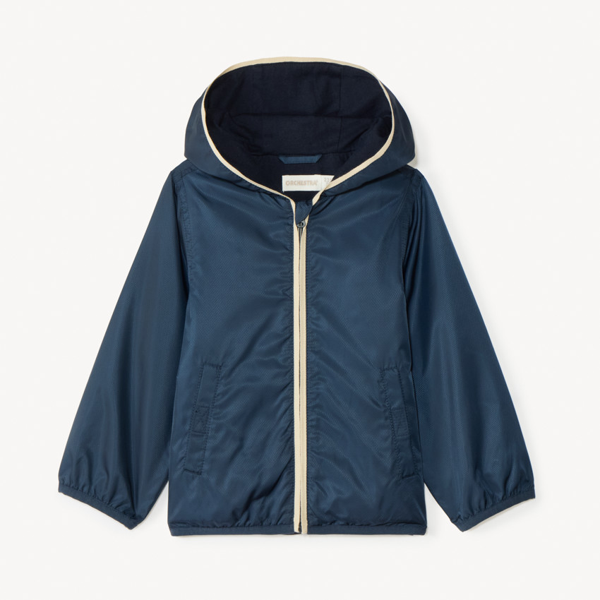 Cortavientos liso forrado en jersey para niño. 