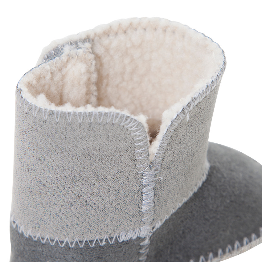 Botas de media caña bicolores con forro de borreguito 