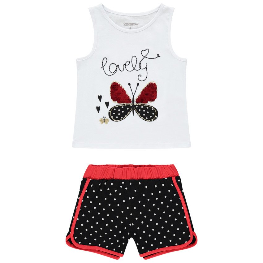 Ensemble avec débardeur à papillon en sequins et short à pois 