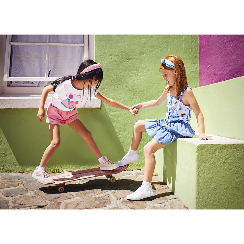 Short de tiro alto liso en algodón fantasía para niña 