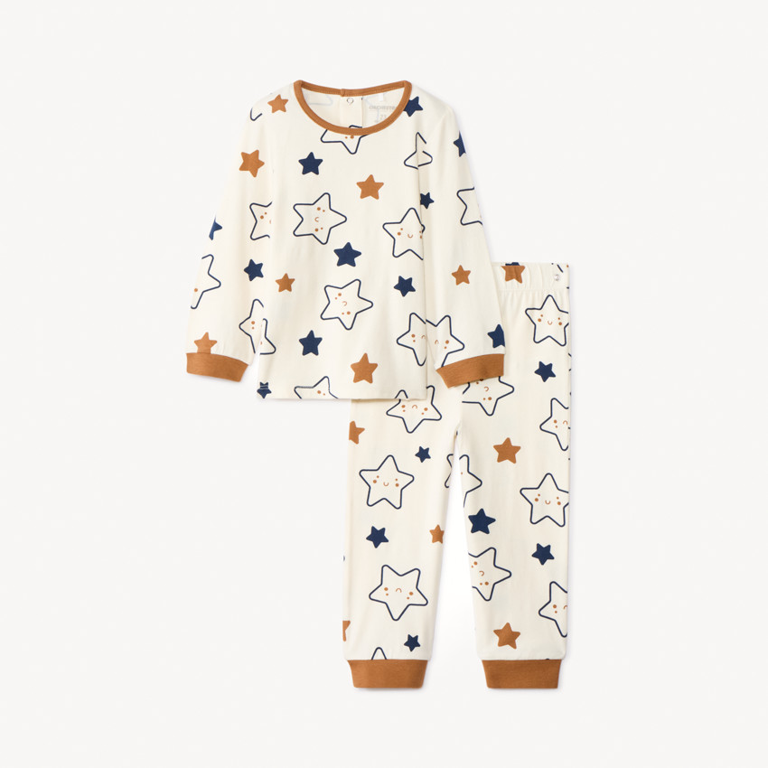 Conjunto pijama estampado de estrellas para bebé niño con acabados según la edad 