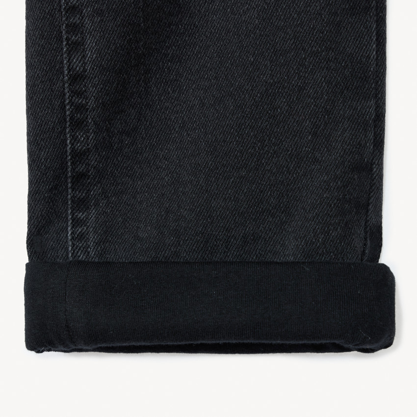 Vaqueros de denim forrados con etiqueta decorativa para niño 