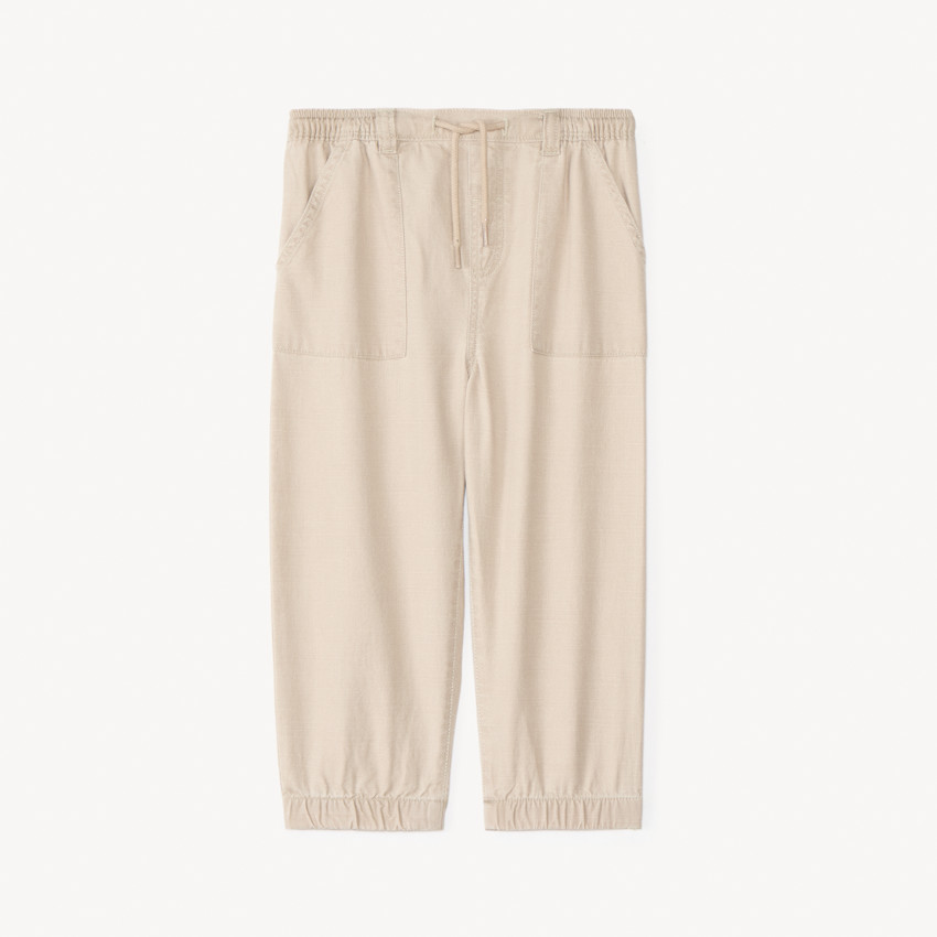 Pantalón de tela con puños para bebé niño. 