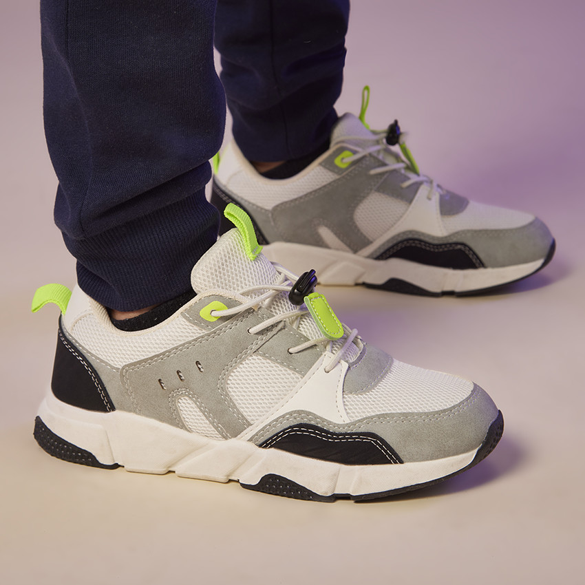 Zapatillas deportivas con cordones elásticos y tope para niño 