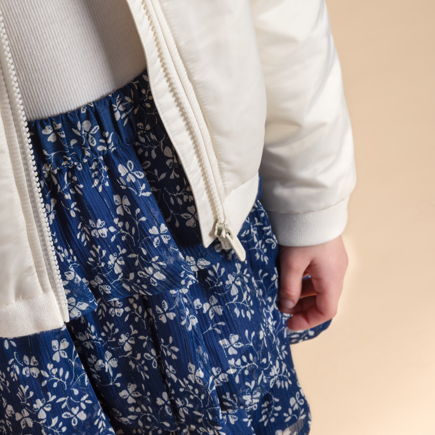 Falda corta de flores en tul con volantes para niña 