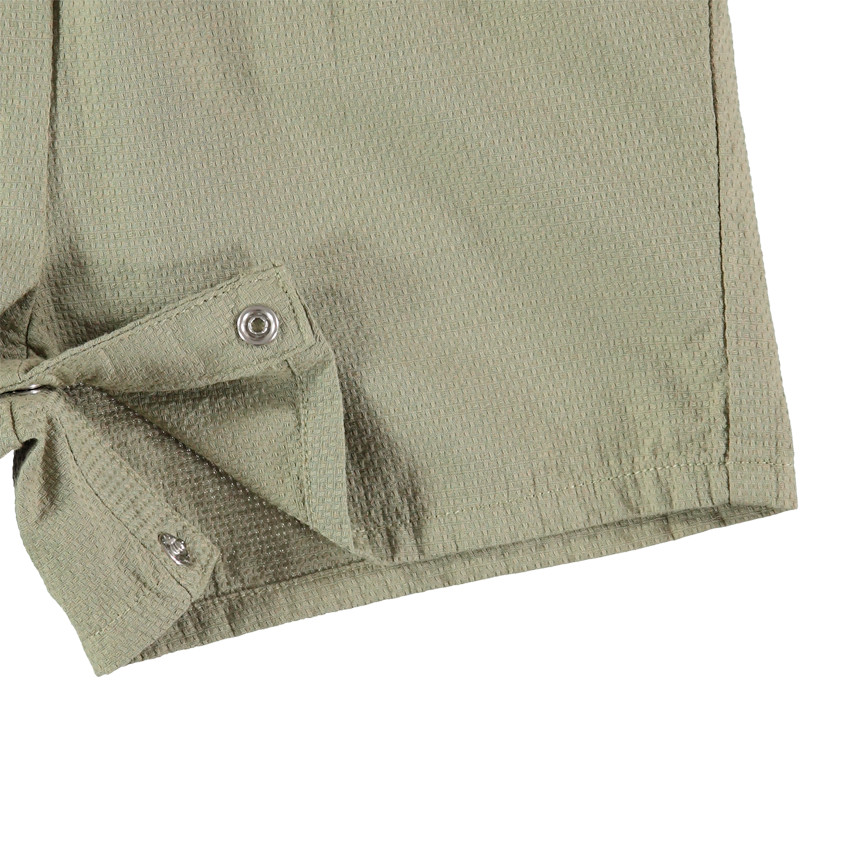 Peto cortos à tirantes con volantes y flamengo rosa estampado 