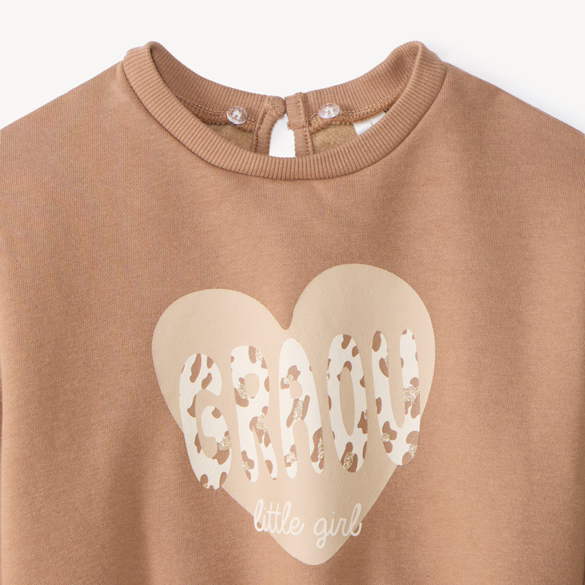 Sudadera niña oversized con cuello Peter Pan desmontable y estampado divertido. 