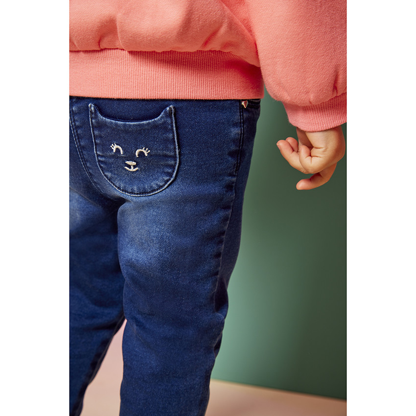 Jeans slim con dos bolsillos tipo parche en forma de gato para bebé niña 