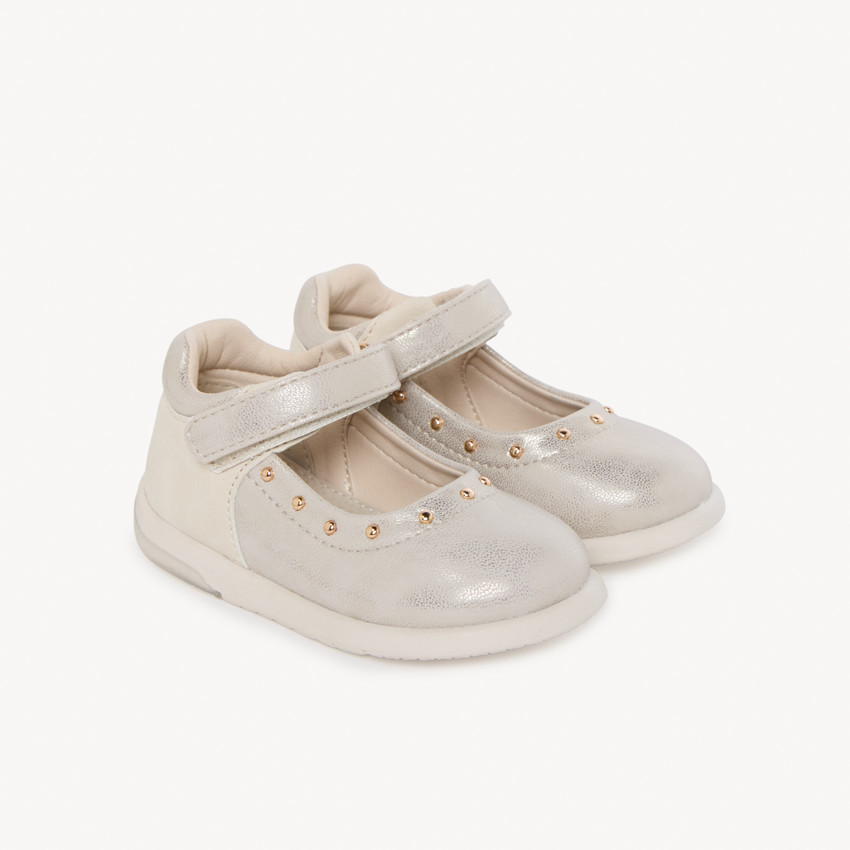 Efecto irisado con remaches dorados para bebé niña. 