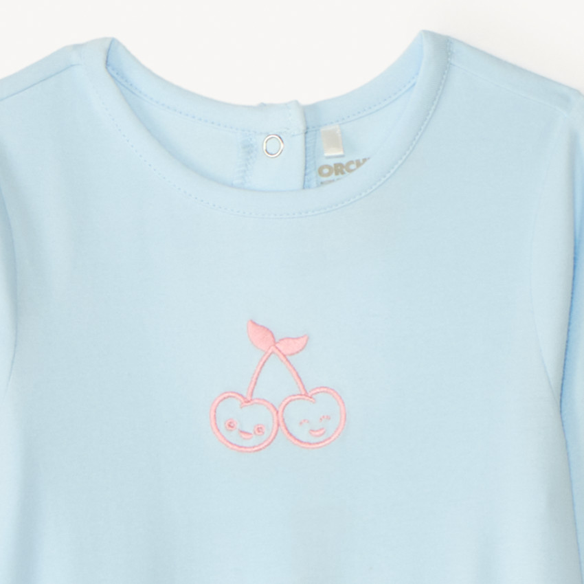 Pijama de jersey con bordado para niña. 