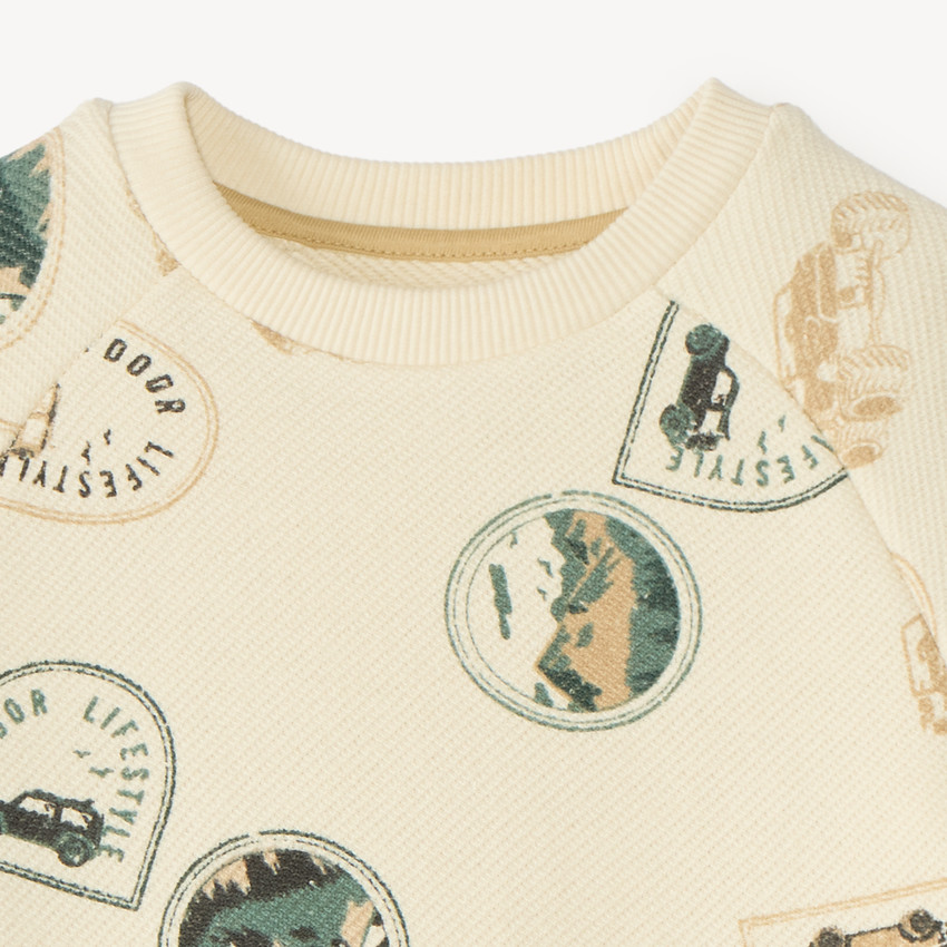 Sudadera de manga larga de felpa con estampado de sellos para niño. 