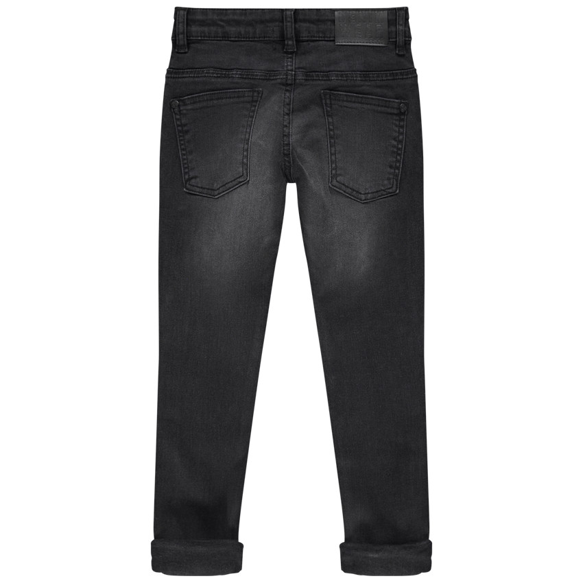 Vaqueros con efecto desgastado y arrugado con corte slim 