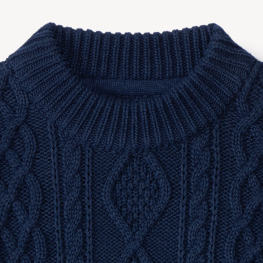 Jersey de punto liso con efecto trenzado y ribete de color para niño 