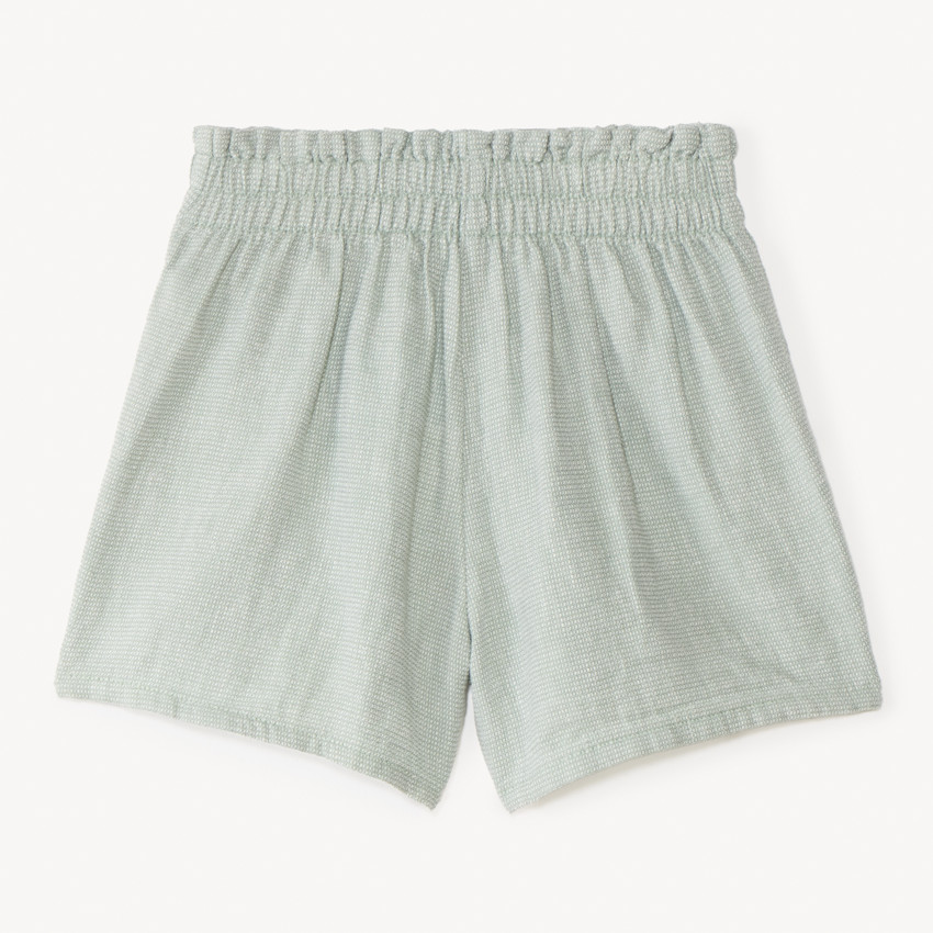 Short de tela con galón de pompones para niña 