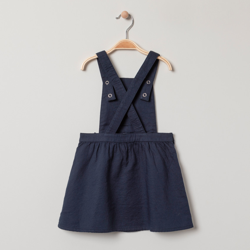 Robe salopette à motifs argentés et noeud 