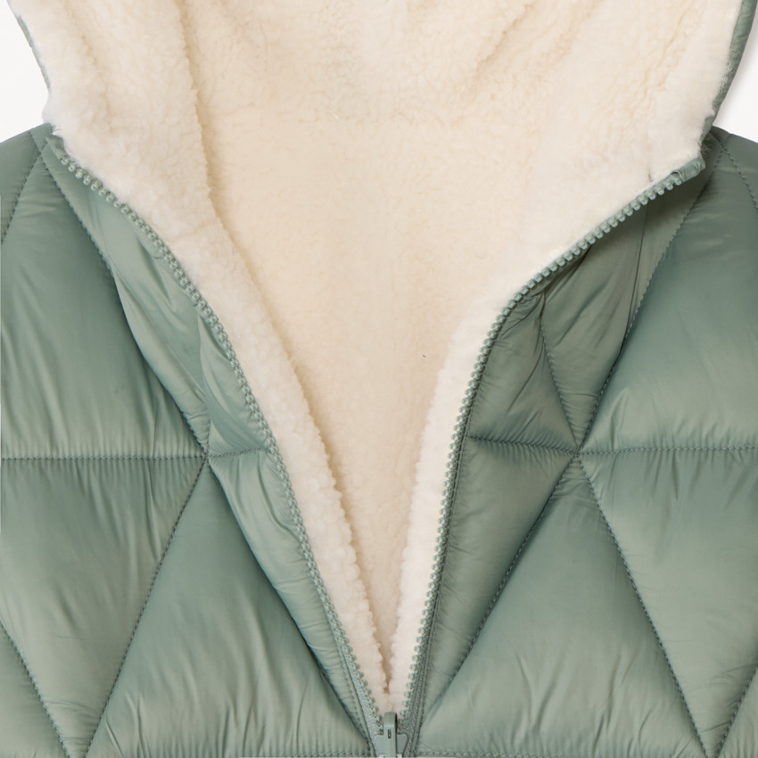 Plumífero largo reversible de dos materiales para niña 