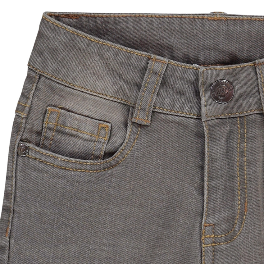 Jean skinny effet used à texte en relief Main Jean skinny effet used à texte en relief