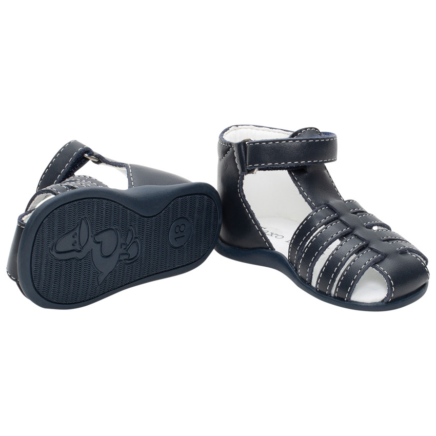 Nu-pieds bleus à brides et lanière à scratch 