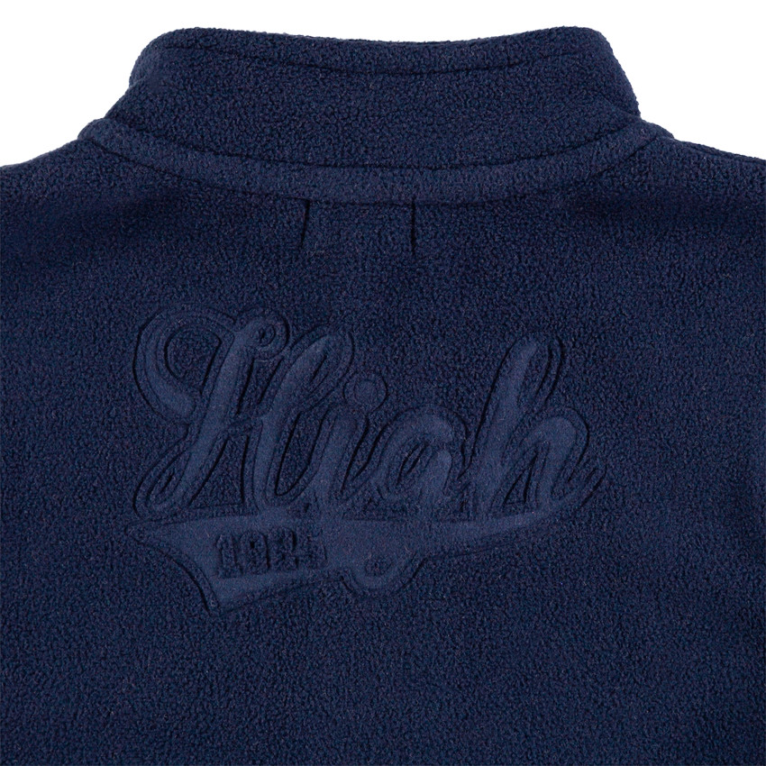 Chaqueta polar con cremallera e inscripción en relieve por detrás 