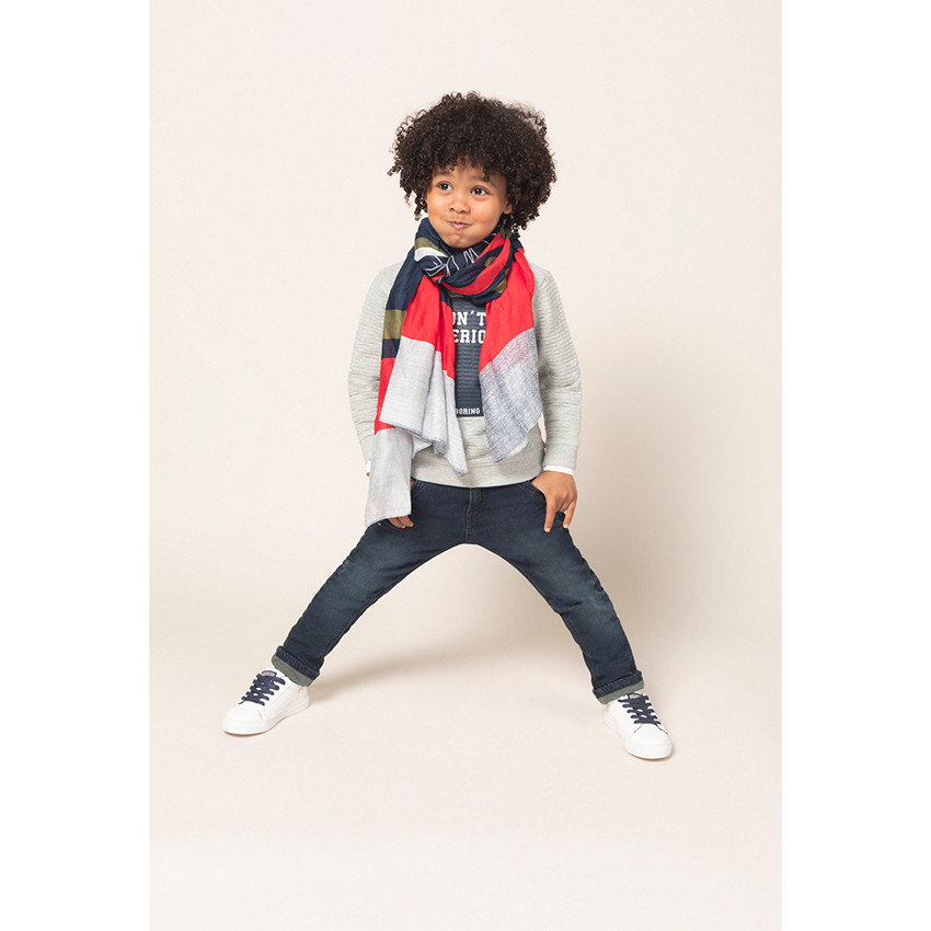 Pañuelo de gasa de viscosa con bicicleta estampada sobre fondo gráfico 