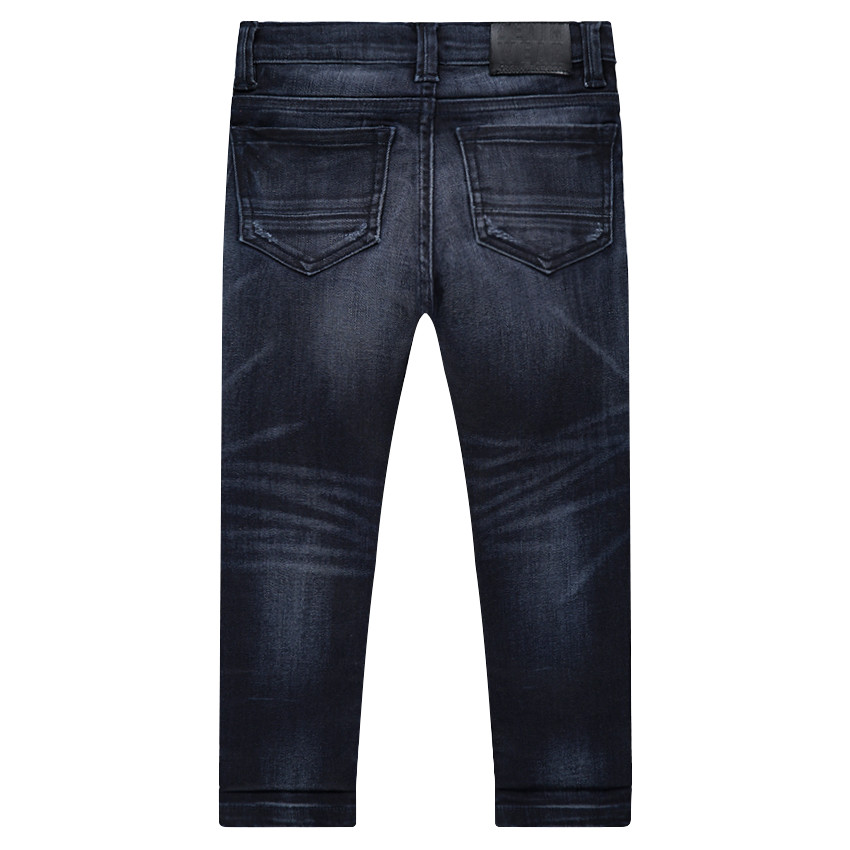 Jeans effet used et crinkle avec déchirures fantaisie 