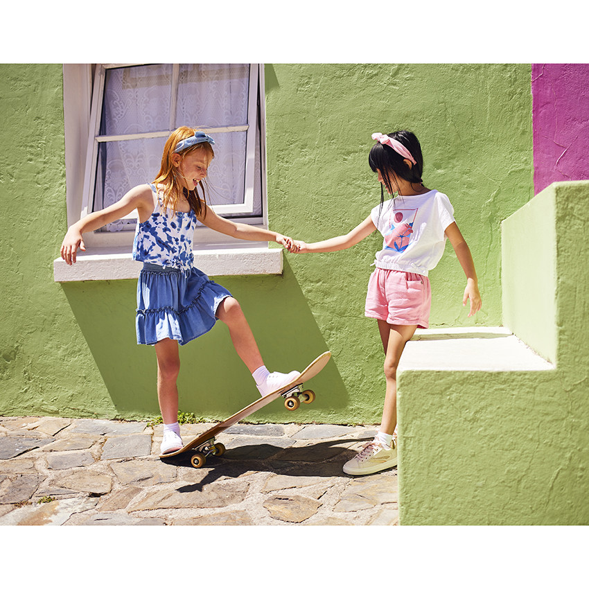 Short de tiro alto liso en algodón fantasía para niña 