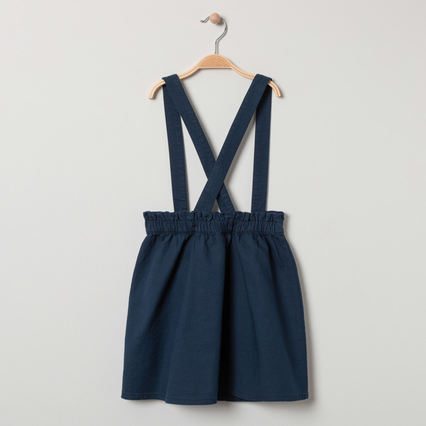 Jupe en toile à bretelles croisées 