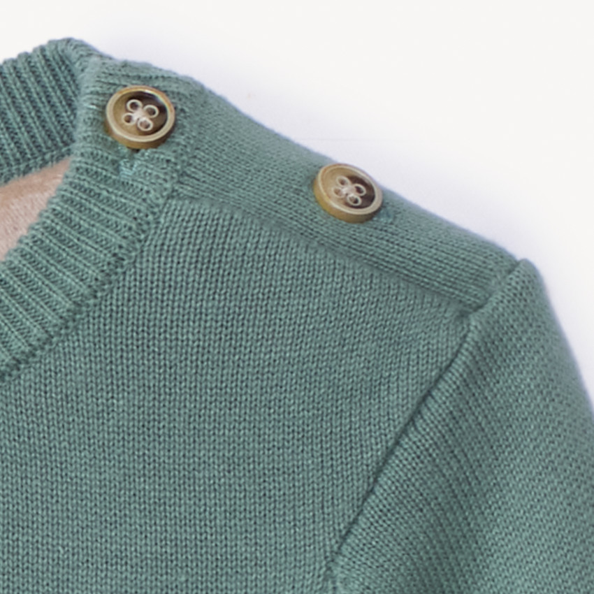 Jersey de punto forrado con diseño de dinosaurio en relieve para niño. 