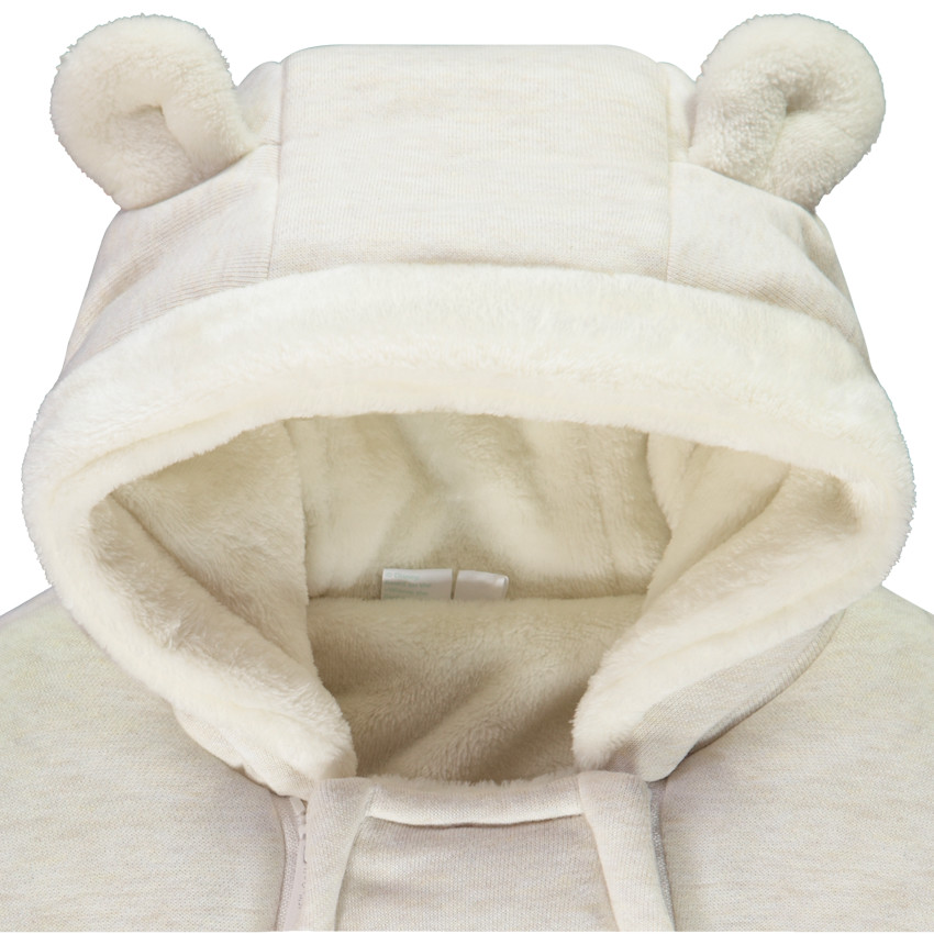 Buzo Winnie Disney para bebé con diferentes acabados según la edad 