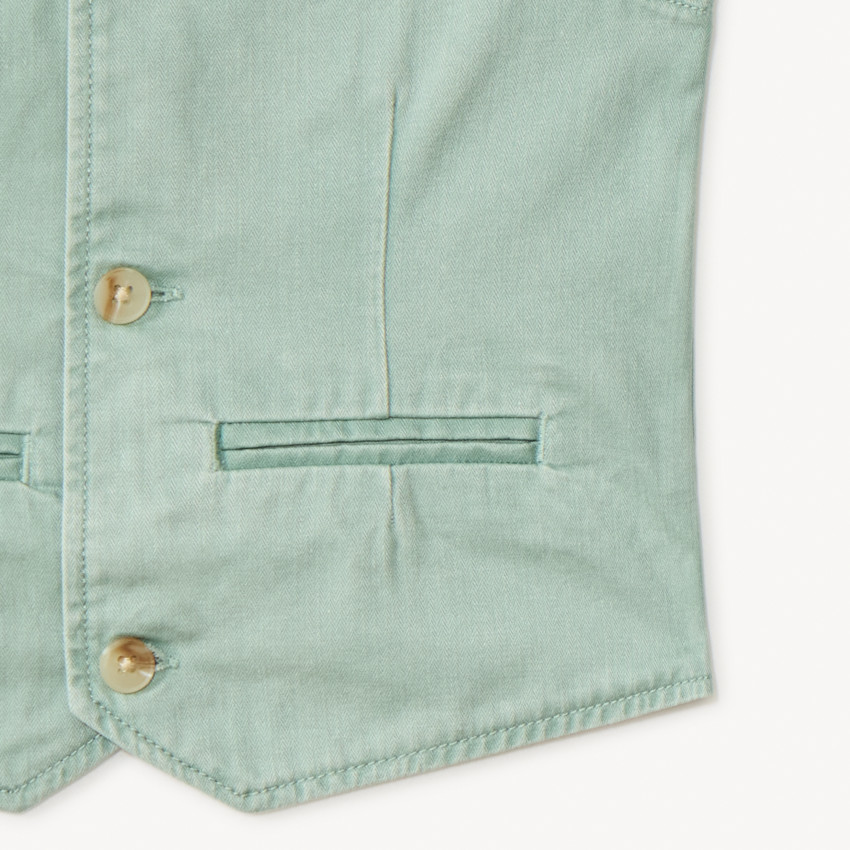 Chaleco de botones en tela lisa para niño 